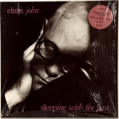 87. ELTON, JOHN-SLEEPING WITH THE PAST-1989-FIRST PRESS UK-HAPPENSTANCE-NMINT/NMINT